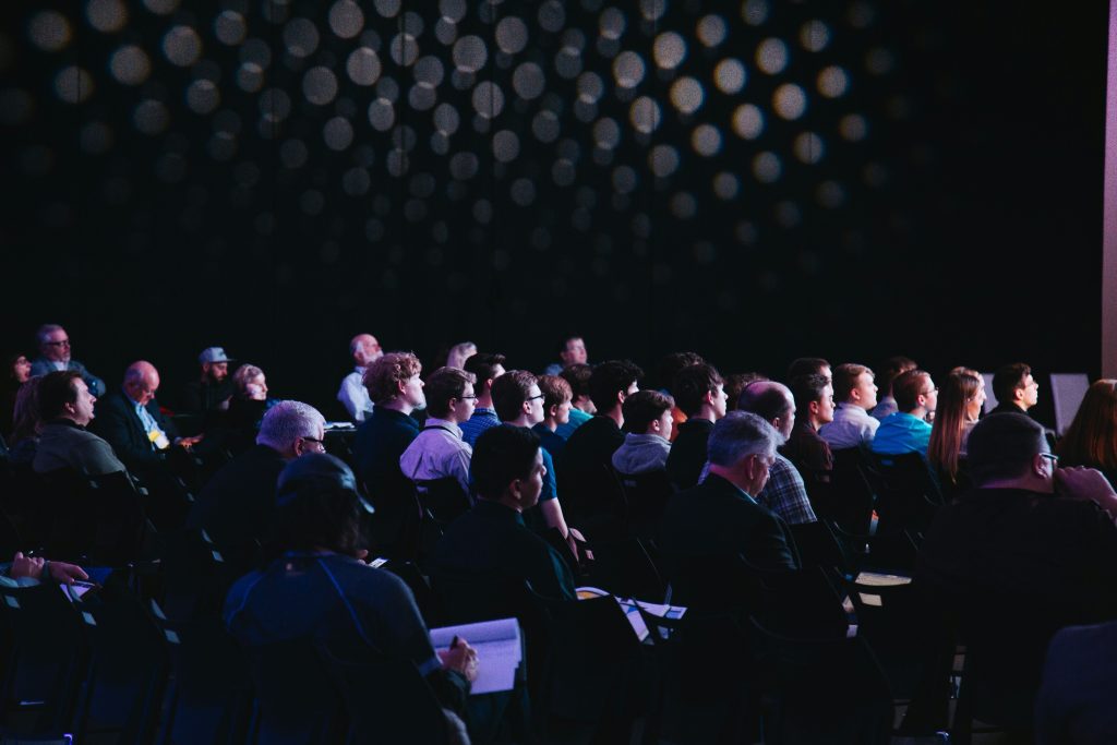 Picture of a conference room full of people